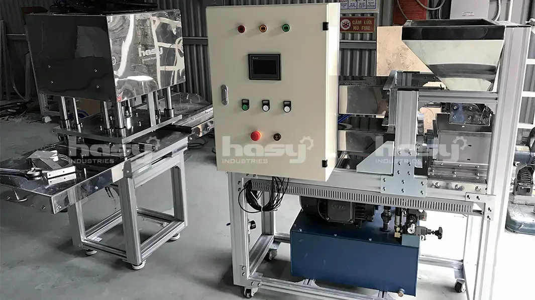 Máy ép bánh khảo với tủ điều khiển